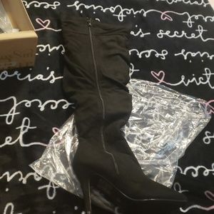 Black suede knee high heel boots